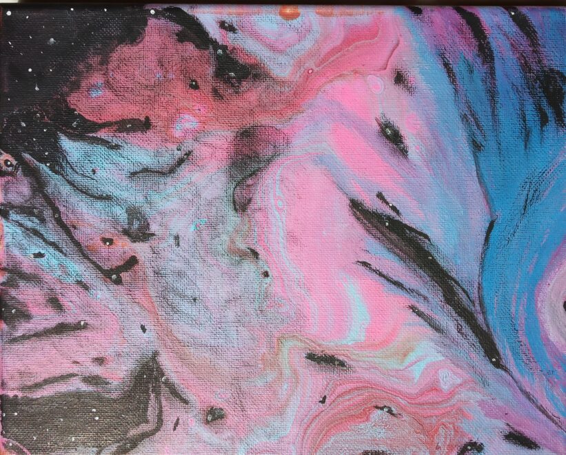 "Unicorn Nebula is a mesmerizing acrylic pour that bridges the vastness of the cosmos with the magic of myth. Vibrant hues of soft pinks, blues, and lavenders swirl across the canvas, reminiscent of a distant, active nebula where stars are born. Against a dramatic, deep black background peppered with stardust, the fluid patterns coalesce to reveal a delicate, ethereal silhouette of a unicorn, seemingly emerging from the cosmic dust. This piece captures the spontaneous beauty of fluid art while inviting the viewer to discover its hidden magic, creating a dreamlike fusion of the celestial and the fantastical."